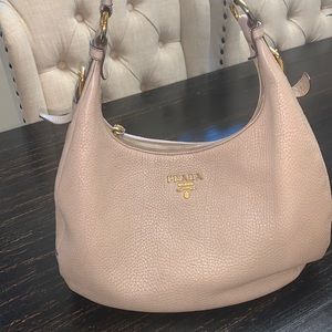 Gently used Prada includes dust bag